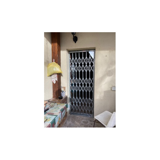 Grille extensible porte